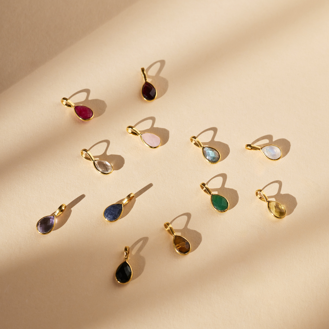 Löwe Citrin Charm Golden