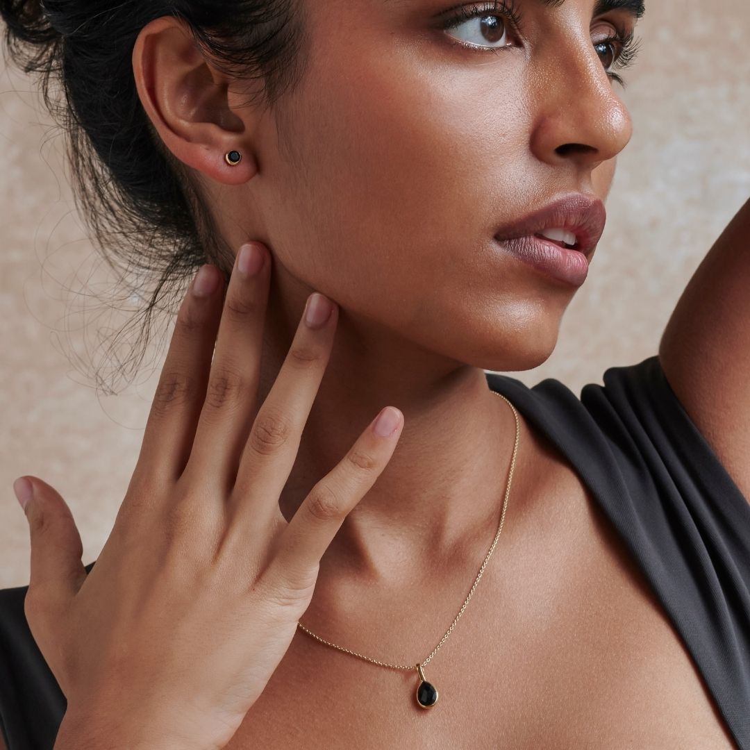 Steinbock Onyx Ohrstecker Golden