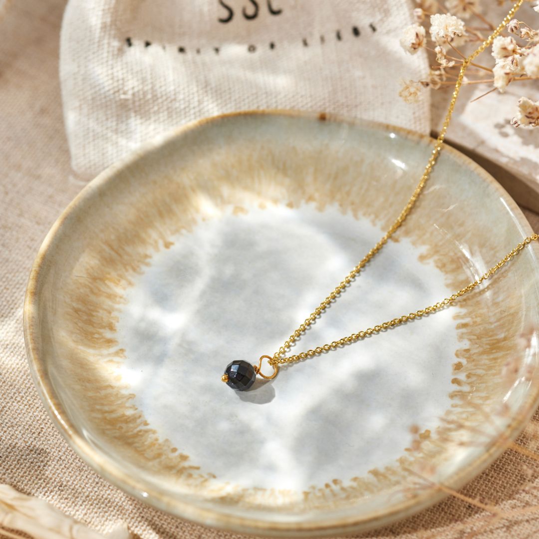 Cosmic Dot Onyx Charm Golden