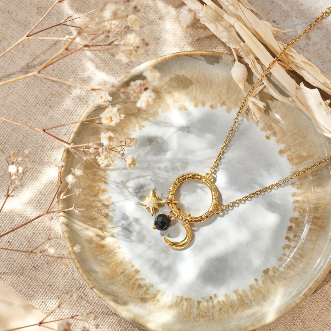 Cosmic Dot Onyx Charm Golden