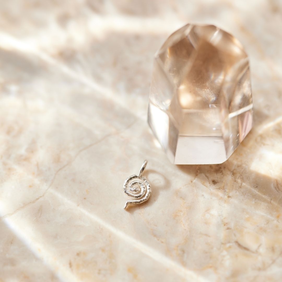 "Echoes of the Universe" Spiral Charm Silber