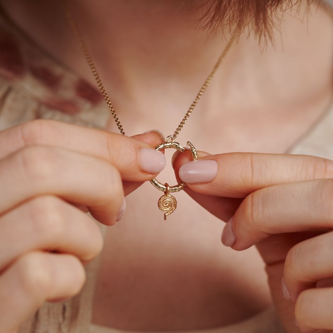 "Echoes of the Universe" Spiral Charm Golden
