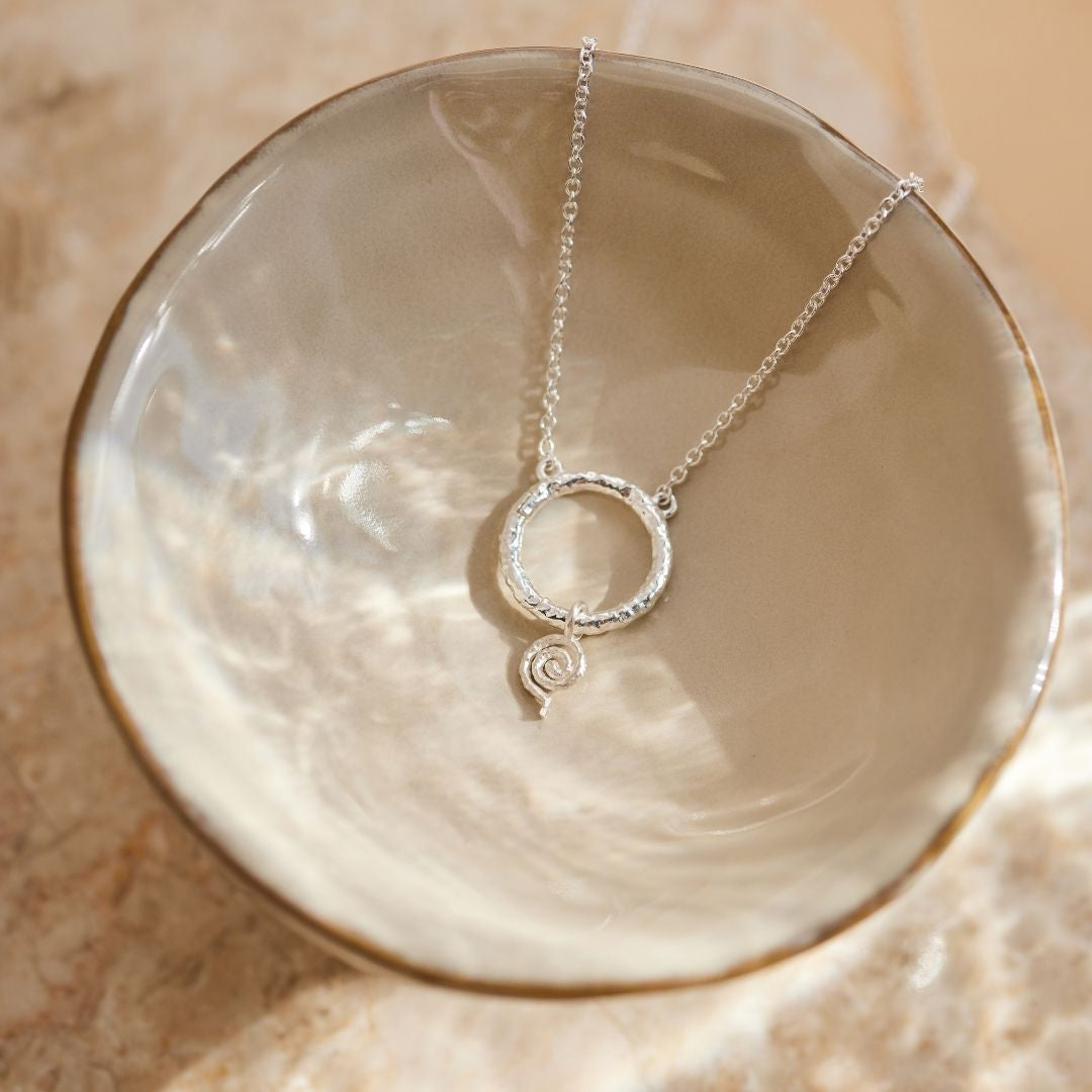 "Echoes of the Universe" Spiral Charm Silber